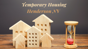 Miniature wooden houses with an hourglass symbolizing temporary housing in Henderson NV